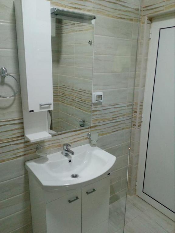Koupelna v ubytování Apartmani M&V