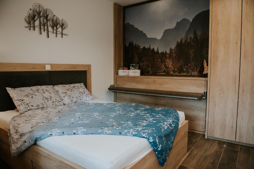 Postel nebo postele na pokoji v ubytování Vila Mojca Apartments Jasna & Jelka