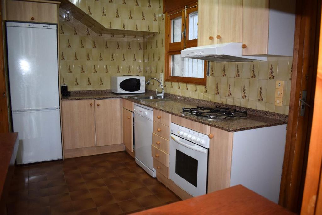 Kuchyň nebo kuchyňský kout v ubytování Villa Salitre
