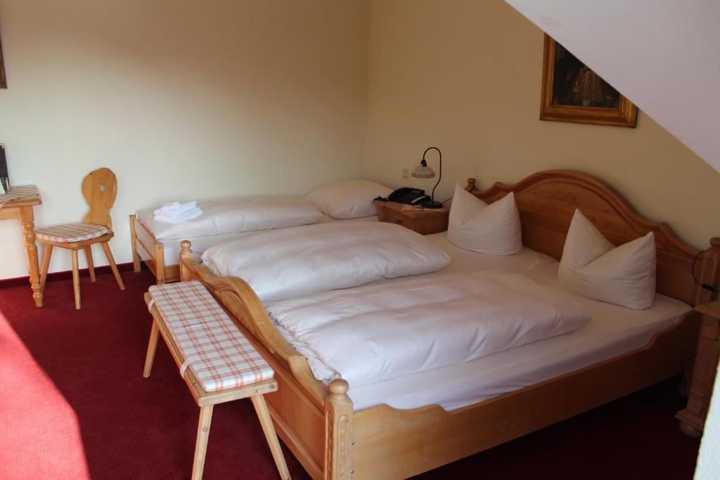 Postel nebo postele na pokoji v ubytování Hotel Knorre
