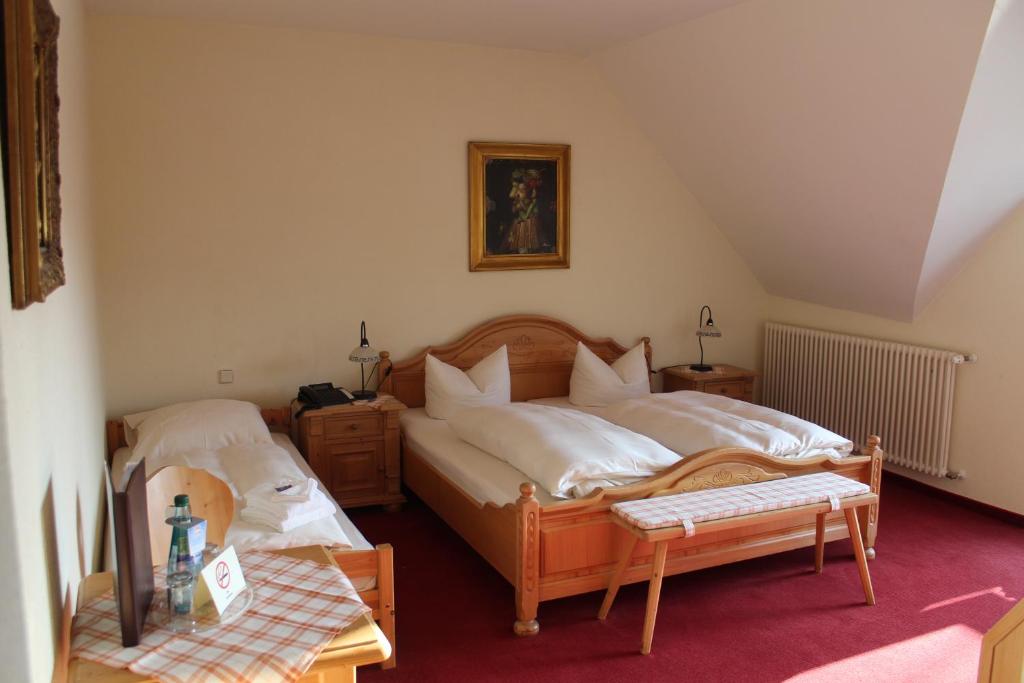 Postel nebo postele na pokoji v ubytování Hotel Knorre