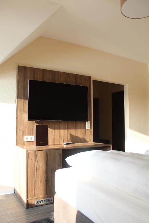 TV a/nebo společenská místnost v ubytování Hotel Knorre