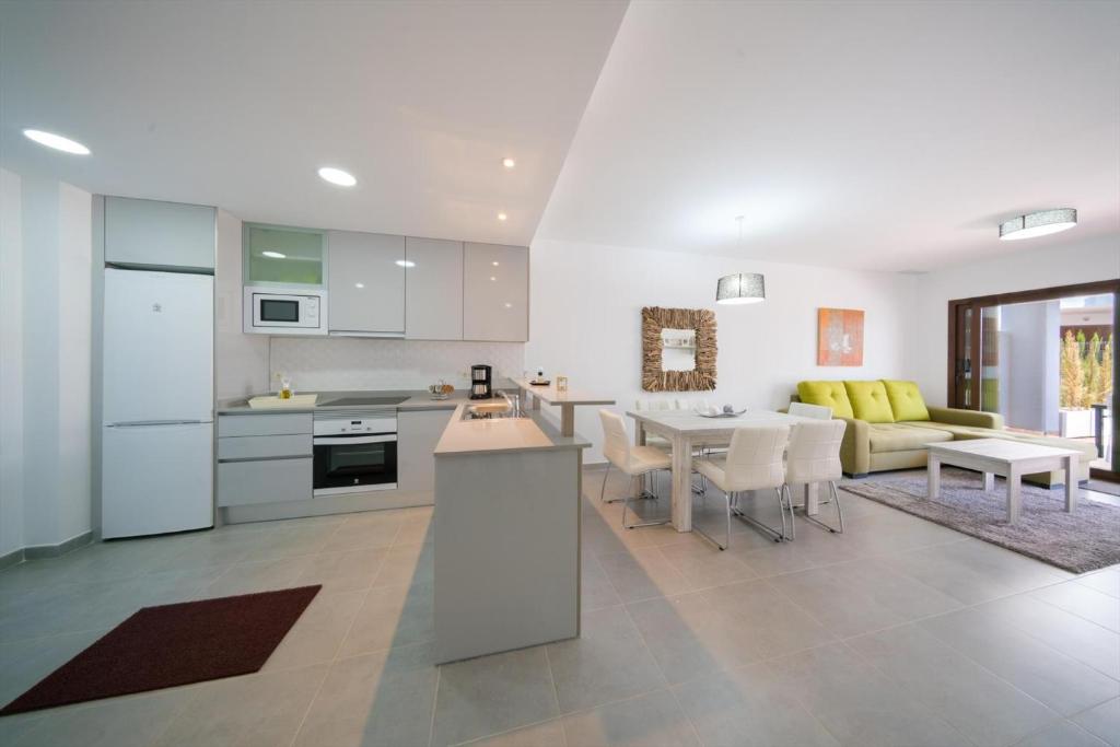 Kuchyň nebo kuchyňský kout v ubytování Apartment Cerezas