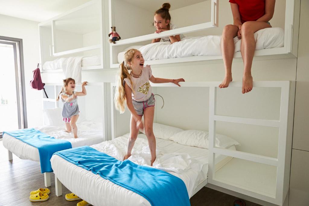 Postel nebo postele na pokoji v ubytování Hotel Europa Monetti