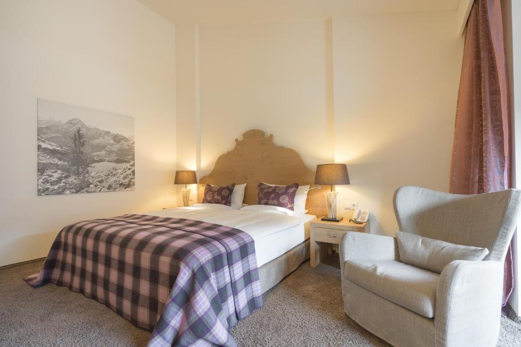 Postel nebo postele na pokoji v ubytování Hotel Exquisit