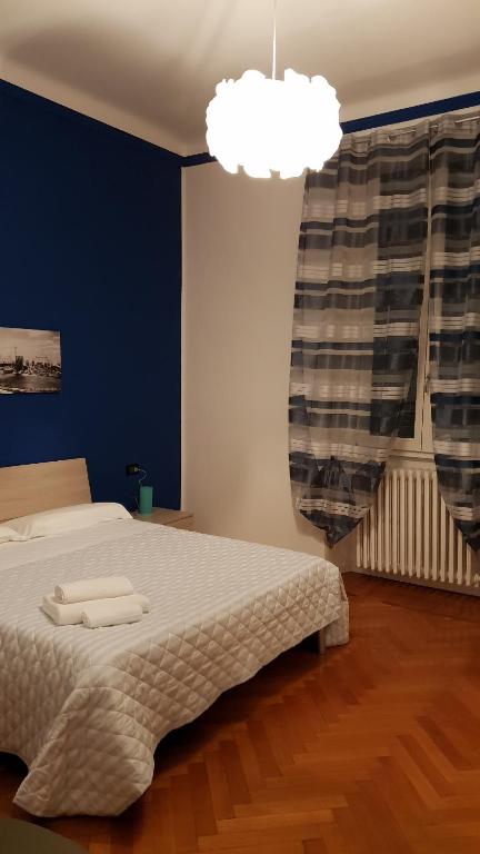 Łóżko lub łóżka w pokoju w obiekcie cesena3 plus