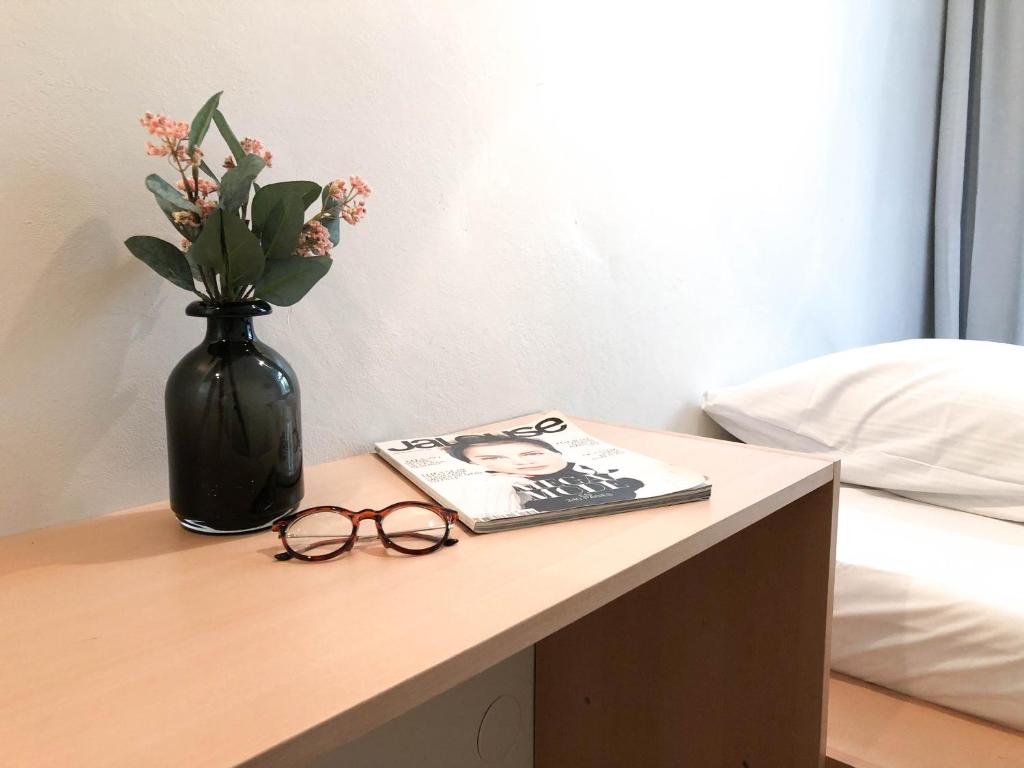 Postel nebo postele na pokoji v ubytování Pension Absolut Berlin