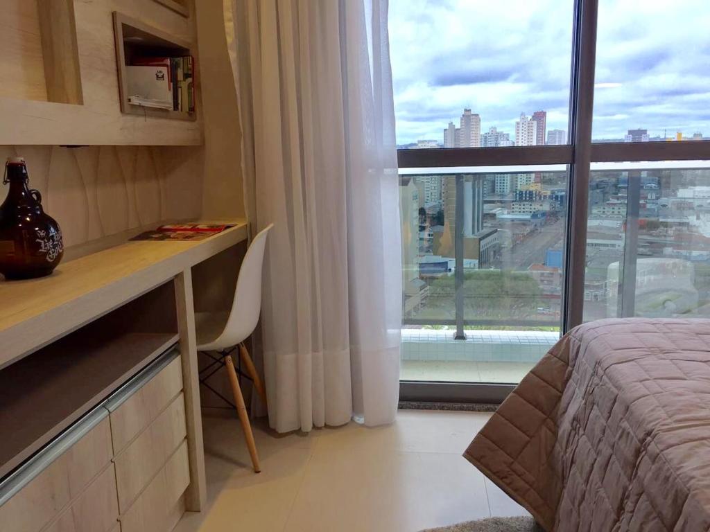  Estudio moderno com linda vista para a Serra