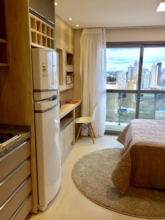  Estudio moderno com linda vista para a Serra