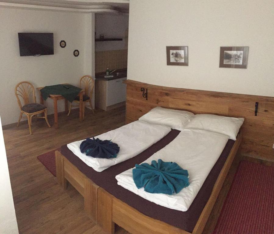 Postel nebo postele na pokoji v ubytování Tuxie Haus