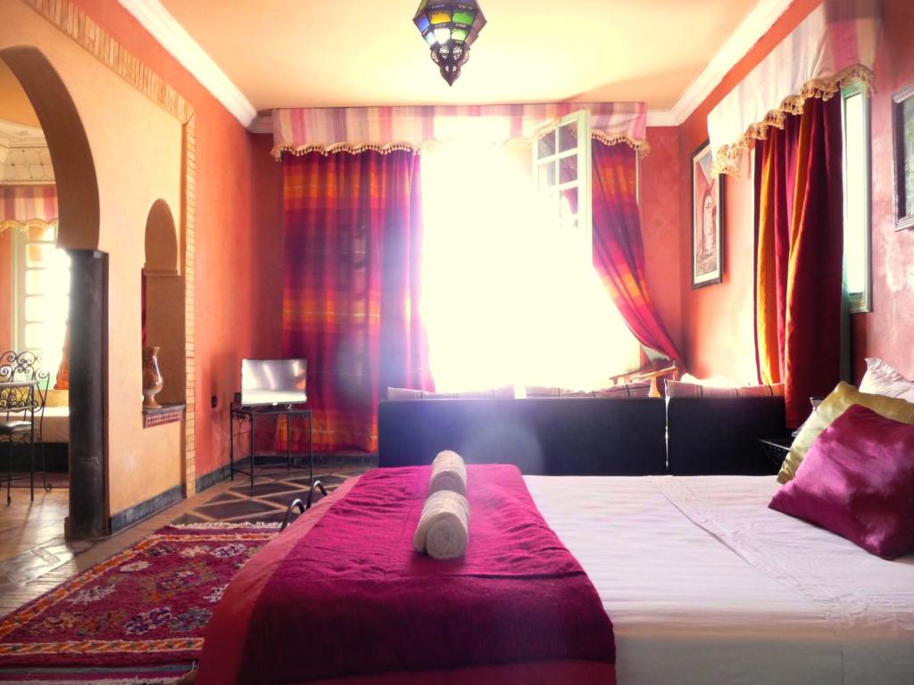 Кровать или кровати в номере L'Arganier Solitaire