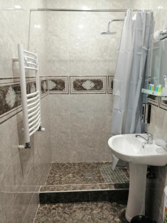 Koupelna v ubytování Hotel IVERIA