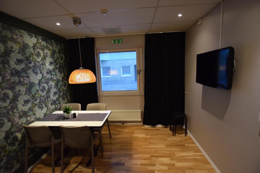 TV a/nebo společenská místnost v ubytování Hostel Snoozemore