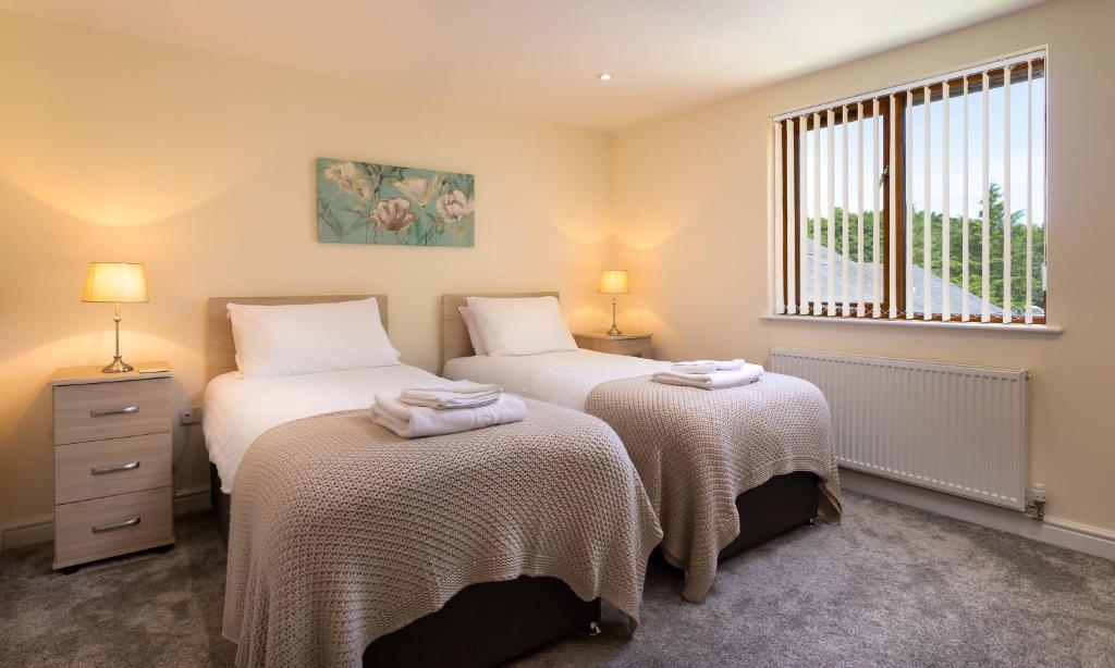 Ein Bett oder Betten in einem Zimmer der Unterkunft Tewitfield Marina