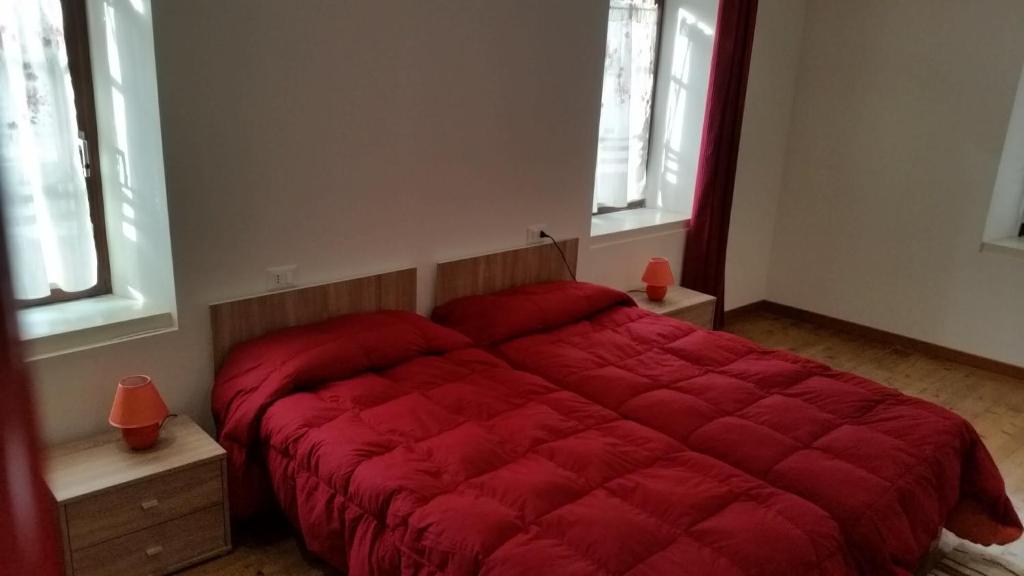 Postel nebo postele na pokoji v ubytování La Perla della Drava