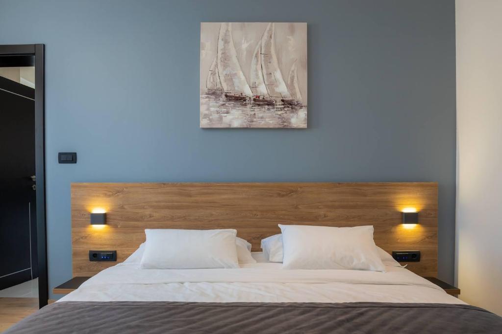Posteľ alebo postele v izbe v ubytovaní Beachfront Luxury Villa