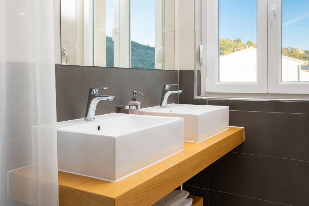 Kúpeľňa v ubytovaní Beachfront Luxury Villa