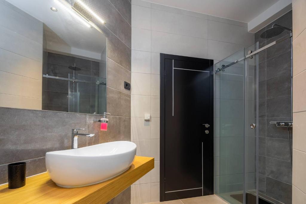 Kúpeľňa v ubytovaní Beachfront Luxury Villa
