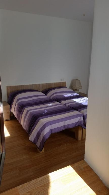 Postel nebo postele na pokoji v ubytování La Perla della Drava