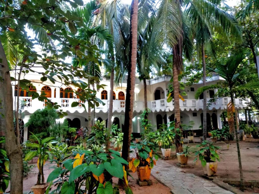 Zahrada ubytování Palm Beach Resort by Yosha Guest