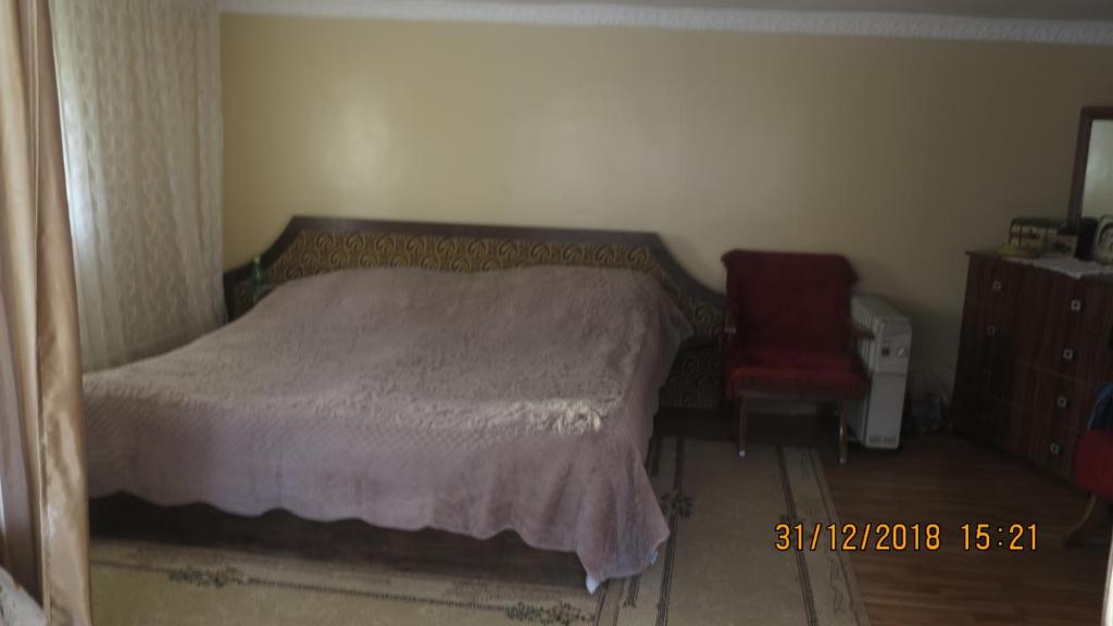 Postel nebo postele na pokoji v ubytování Guest House Gio