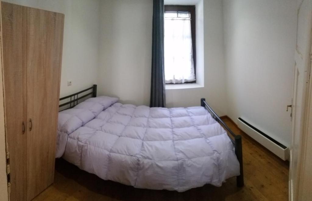 Postel nebo postele na pokoji v ubytování La Perla della Drava