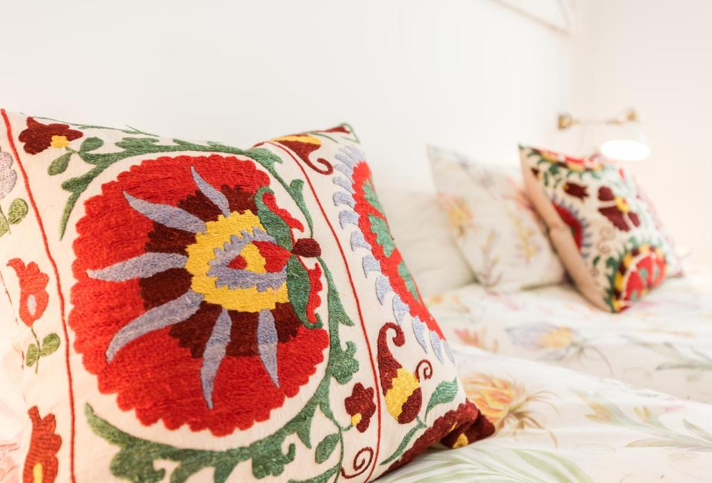 A bed or beds in a room at Urban Santa Ana Madrid Centro