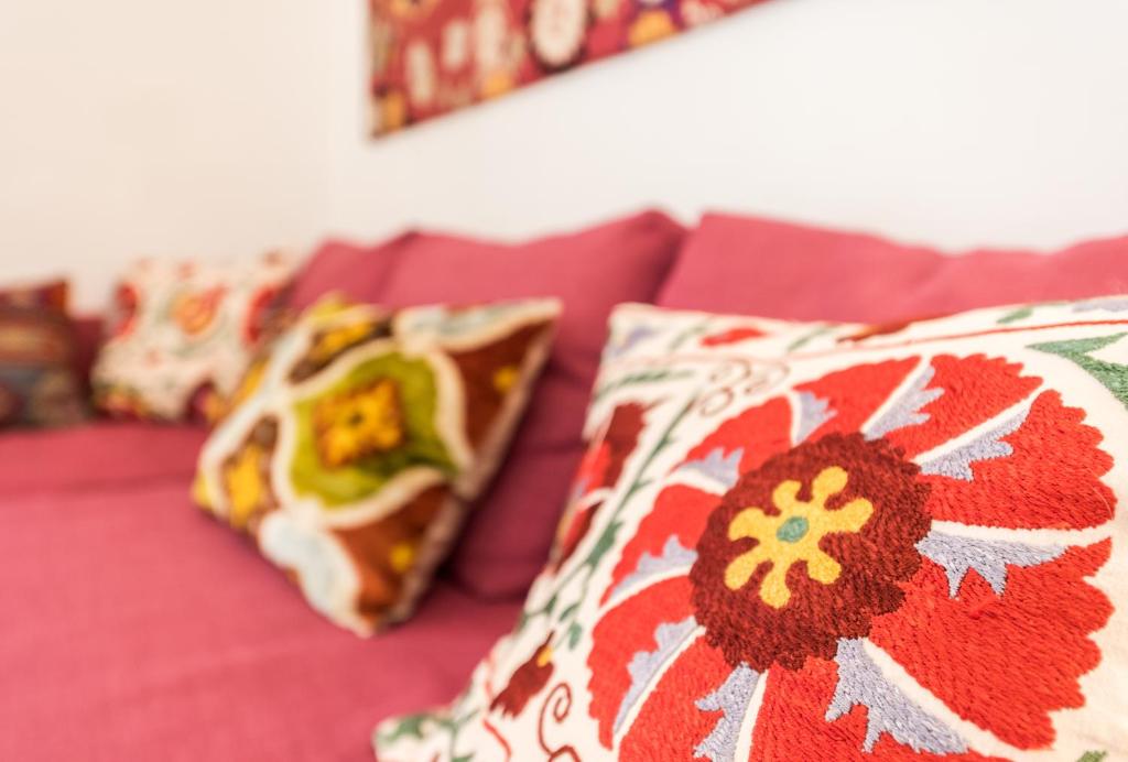 A bed or beds in a room at Urban Santa Ana Madrid Centro