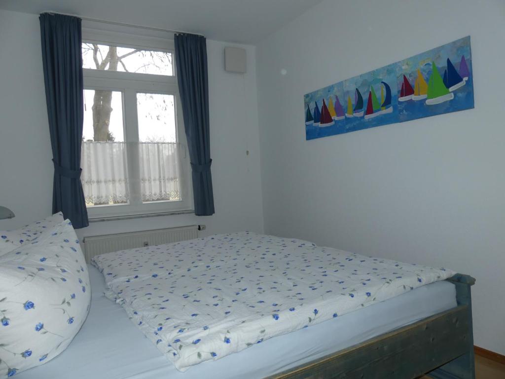 Postel nebo postele na pokoji v ubytování Landhaus am Haff