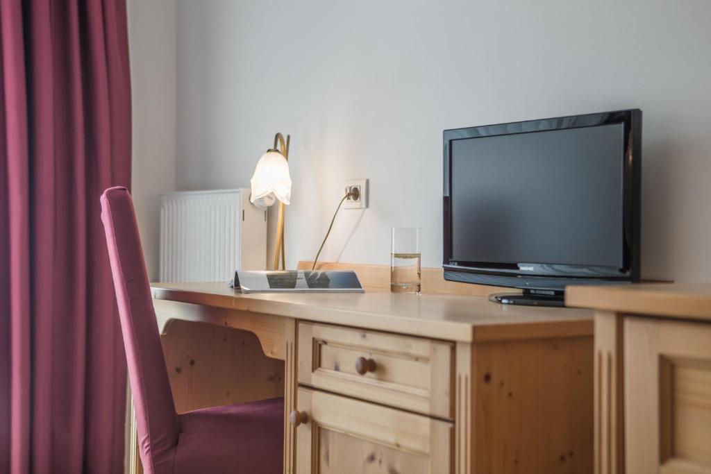 TV a/nebo společenská místnost v ubytování Hotel Innerhofer