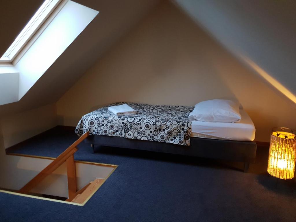 Posteľ alebo postele v izbe v ubytovaní Tajemniczy Ogród Szczytna - Bed & Breakfast