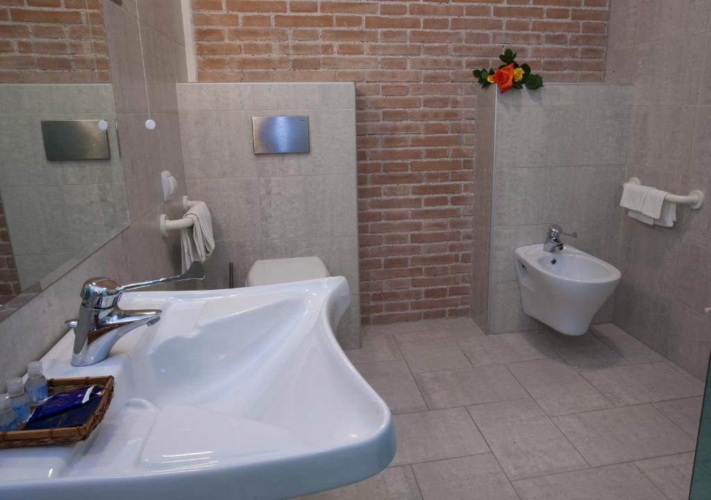 Koupelna v ubytování Hotel Adriatico