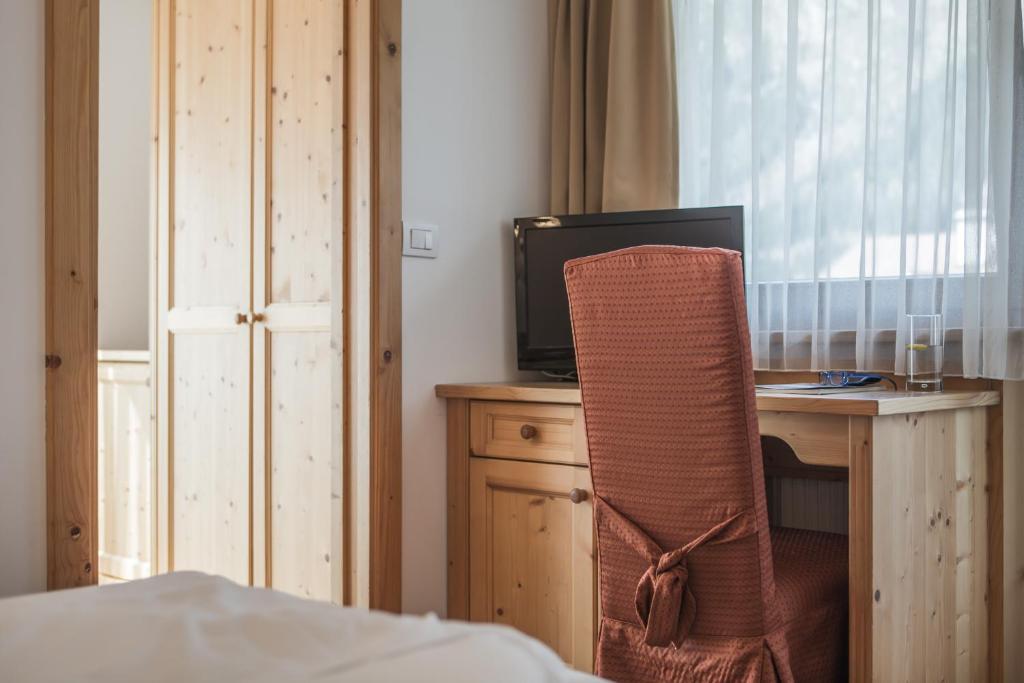 Postel nebo postele na pokoji v ubytování Hotel Innerhofer
