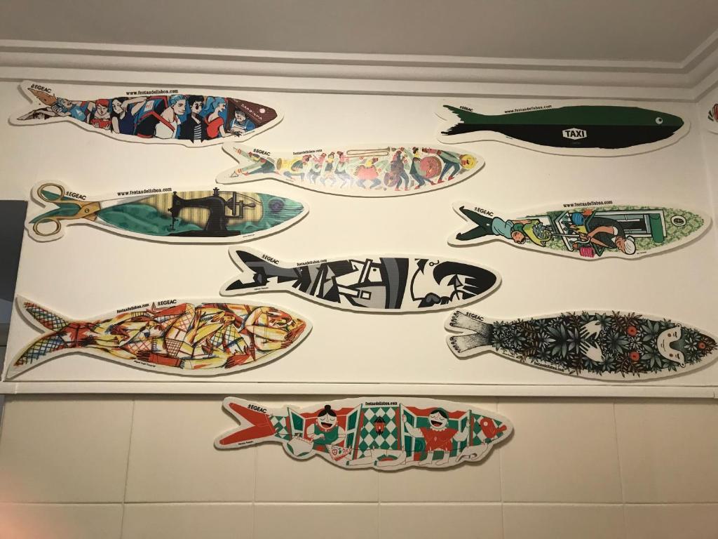 a group of plates on a wall at My apartment in Sacavém in Sacavém