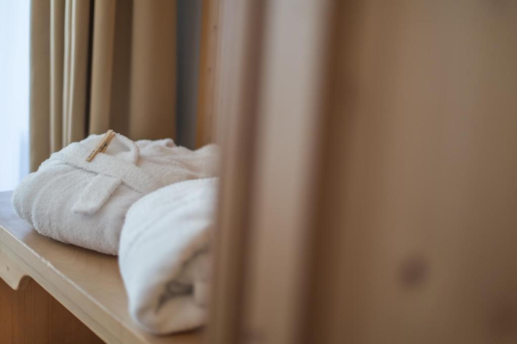 Postel nebo postele na pokoji v ubytování Appartement & Hotel Innerhofer