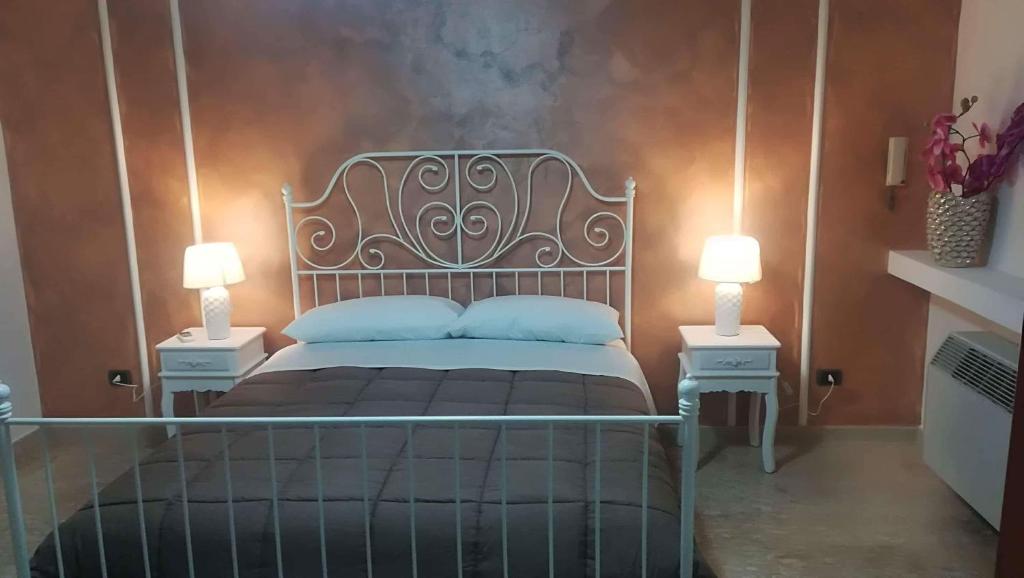 Postel nebo postele na pokoji v ubytování Appartamento mare e monti Two