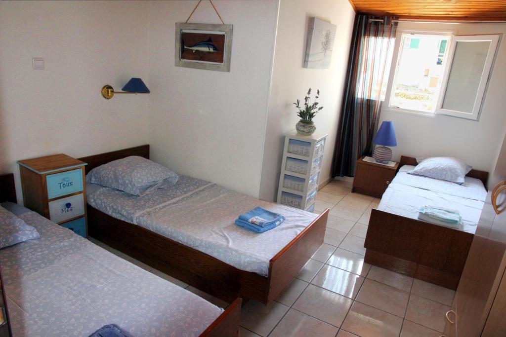 Posteľ alebo postele v izbe v ubytovaní Villa Masline
