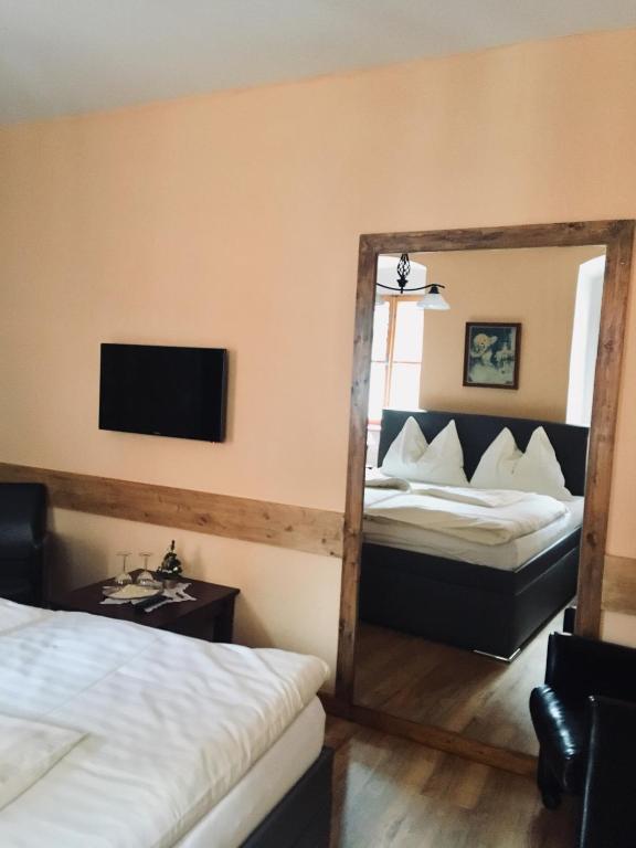 Postel nebo postele na pokoji v ubytování Pension & Restaurant Atmosféra