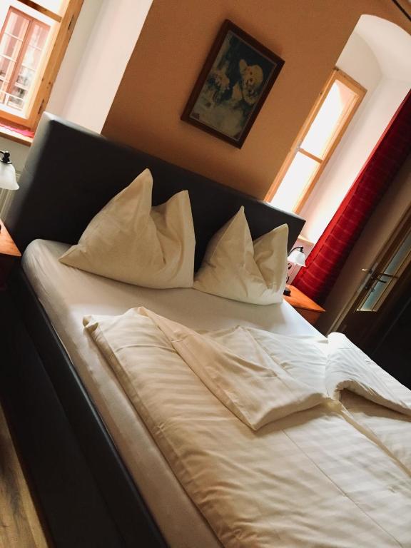 Postel nebo postele na pokoji v ubytování Pension & Restaurant Atmosféra
