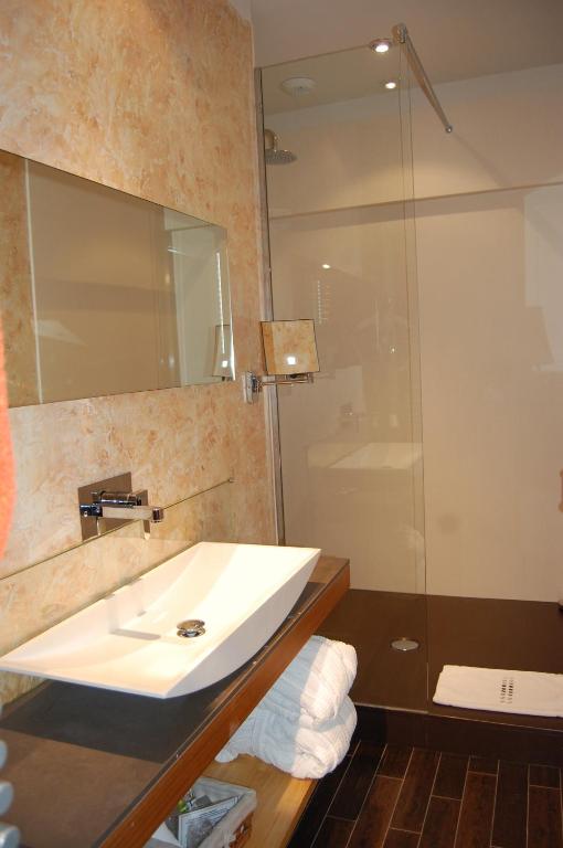 Salle de bains dans l'établissement L'Esplanade