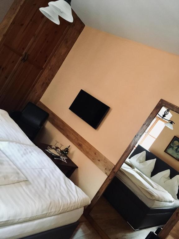 Postel nebo postele na pokoji v ubytování Pension & Restaurant Atmosféra