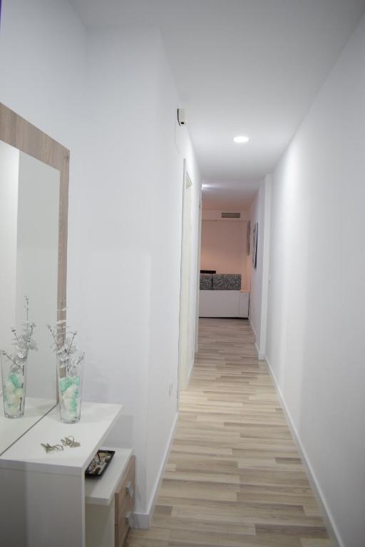 Postel nebo postele na pokoji v ubytování Wallada Damasco
