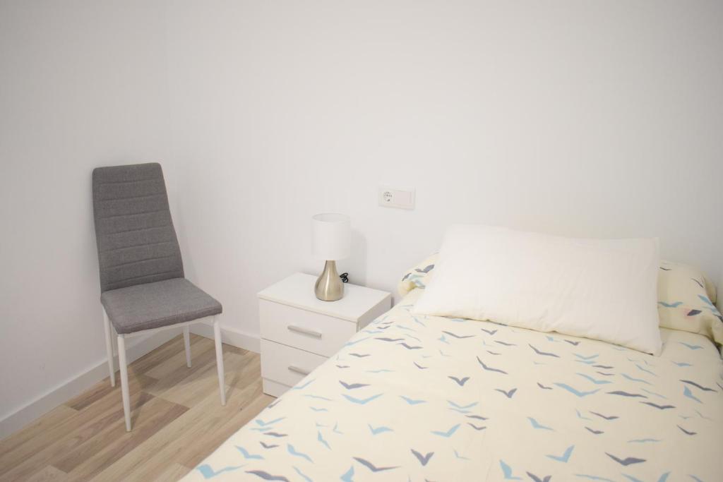 Postel nebo postele na pokoji v ubytování Wallada Damasco