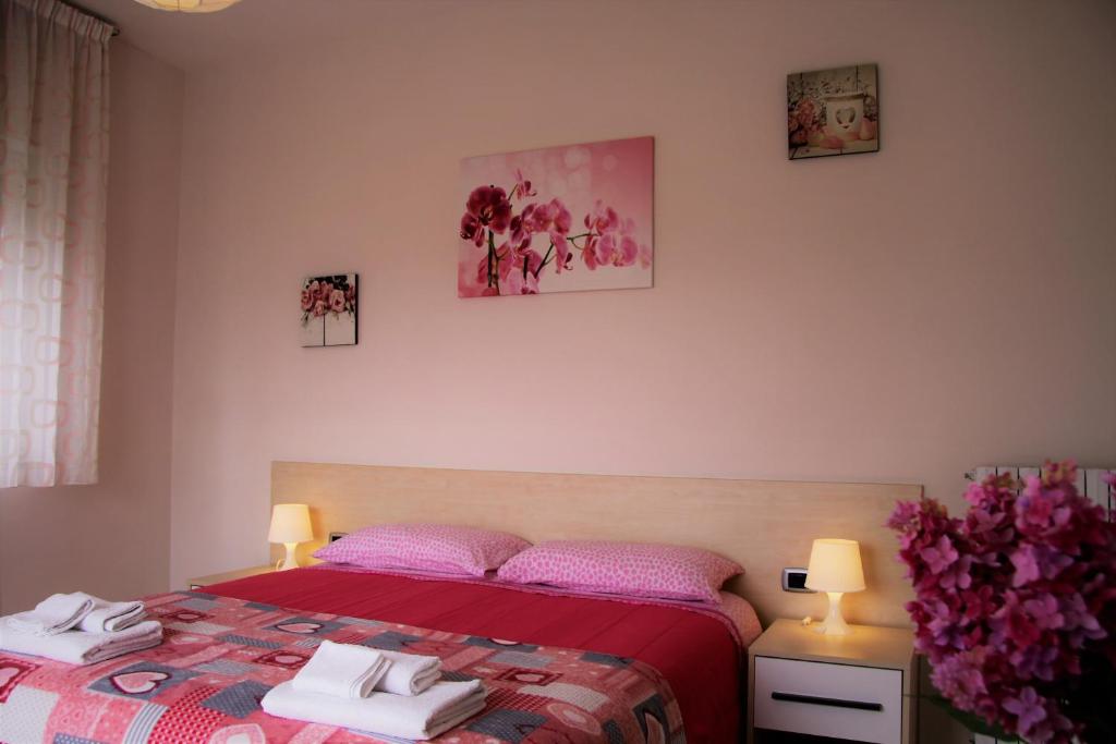Postel nebo postele na pokoji v ubytování Zefiro B&B