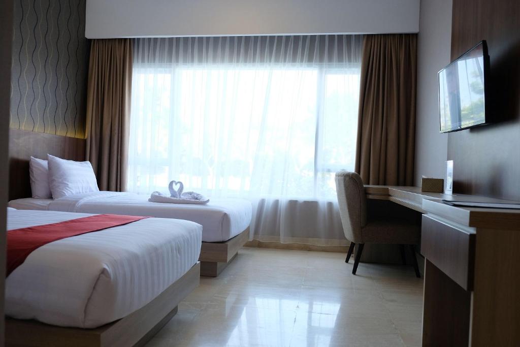 Postel nebo postele na pokoji v ubytování Mexolie Hotel