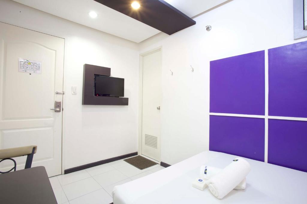 TV a/nebo společenská místnost v ubytování Hotel 99 Cubao