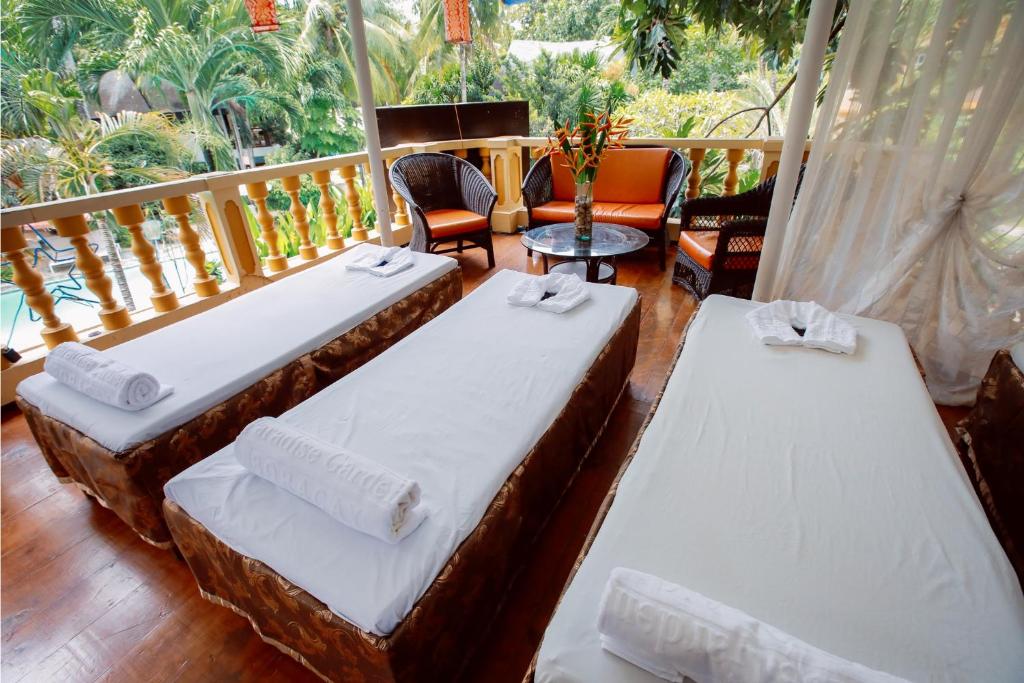 Voodi või voodid majutusasutuse Paradise Garden Hotel and Convention Center Boracay Powered by ASTON toas