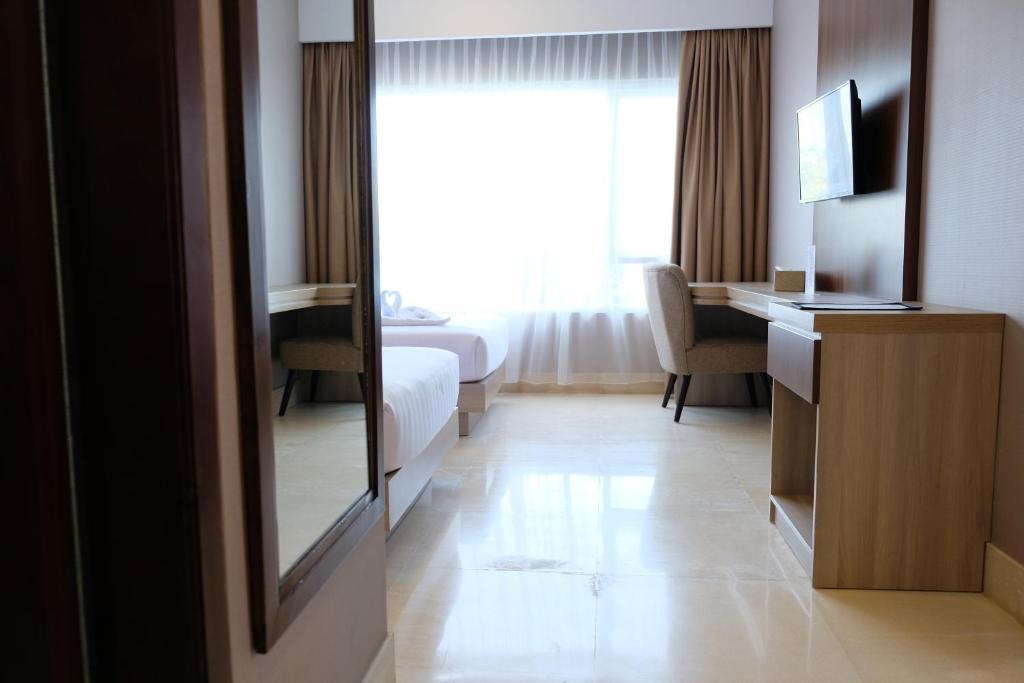 Postel nebo postele na pokoji v ubytování Mexolie Hotel
