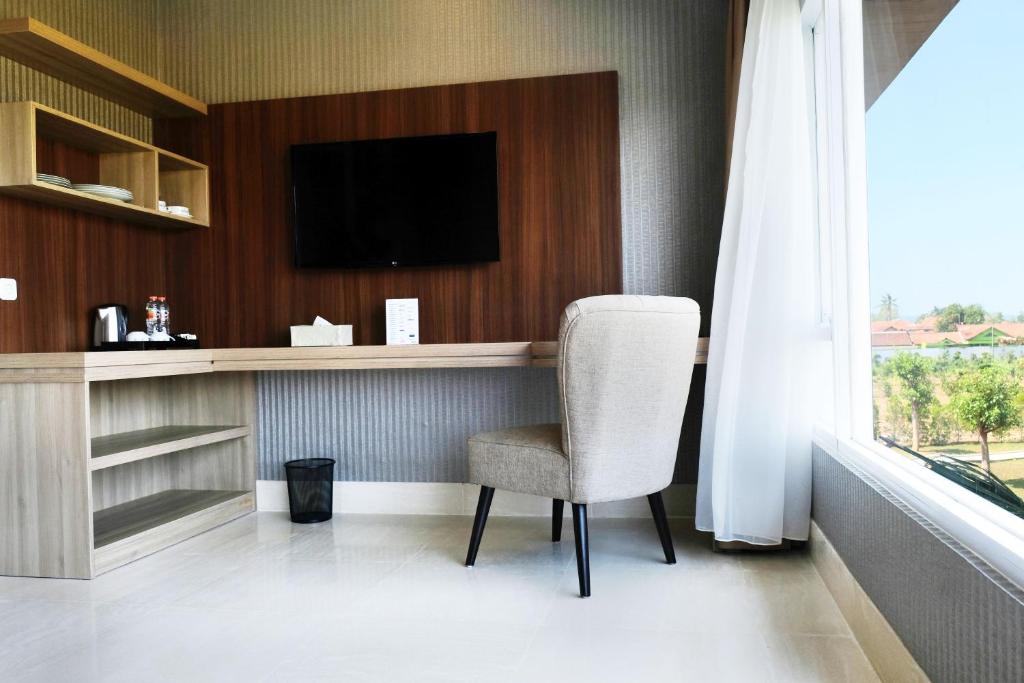 TV a/nebo společenská místnost v ubytování Mexolie Hotel