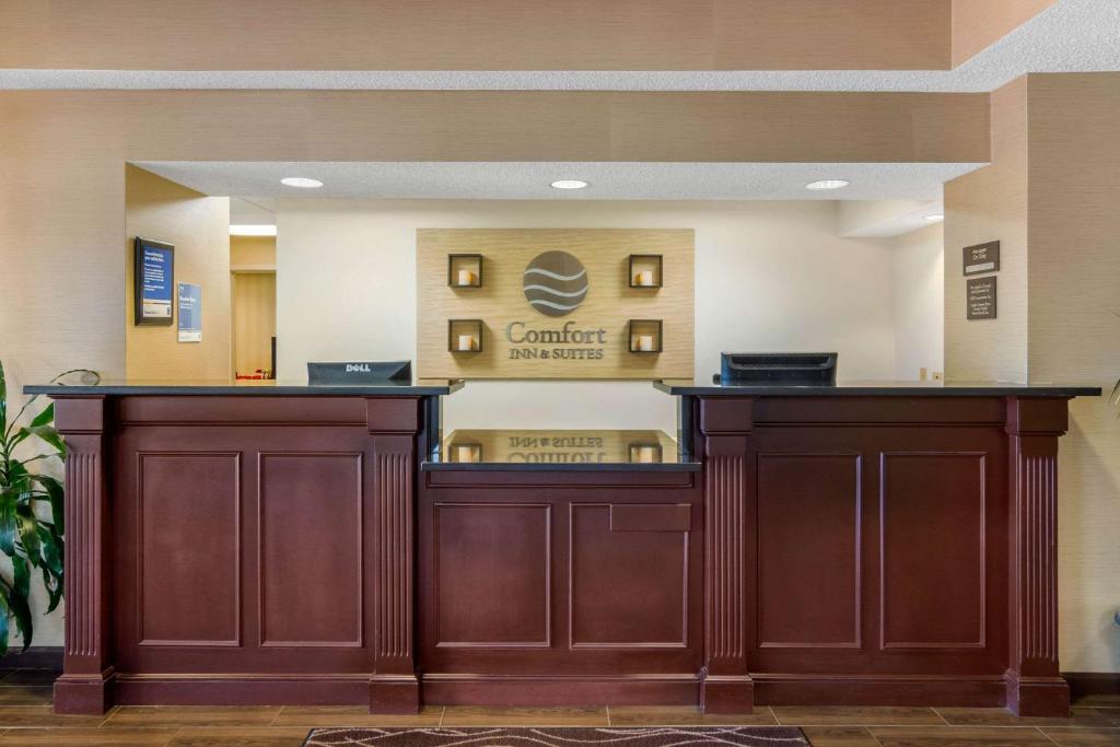 a waiting area at a dental office with two wooden counters at Comfort Inn & Suites in La Grange